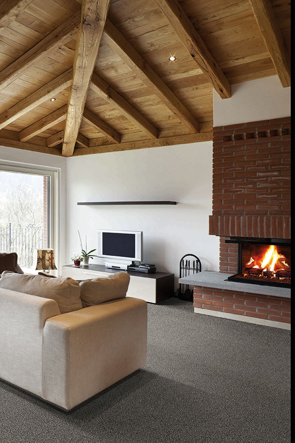 living room with wooden beam ceiling